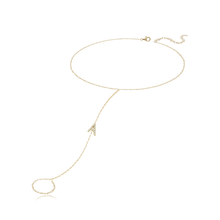 Load image into Gallery viewer, Pave initial diamond hand chain in 14k gold, a timeless and personalized luxury jewelry piece.