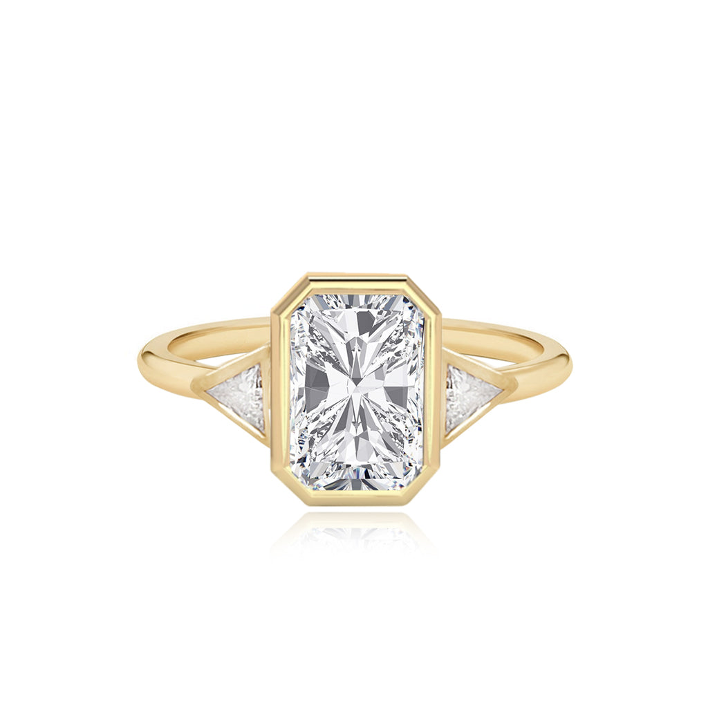 Emerald cut diamond with trillion side stones 2025