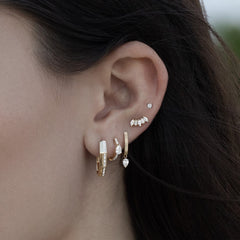 Solitaire Pear Pave Huggie