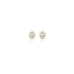 Oval-cut bezel-set lab-grown diamond stud earrings in 14K yellow gold, 2.5 carats total weight