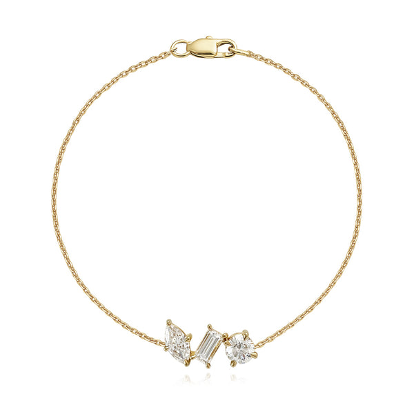 Sparkling three multi-shape diamond bracelet in 14k gold, modern luxury diamond jewelry, fine jewelry online.