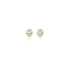 Oval-cut bezel-set lab-grown diamond stud earrings in 14K yellow gold, 3.5 carats total weight