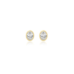 Oval-cut bezel-set lab-grown diamond stud earrings in 14K yellow gold, 5 carats total weight