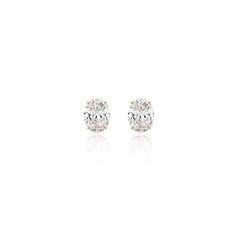 Oval prong-set lab-grown diamond stud earrings in 14K yellow gold, 5 carats total weight
