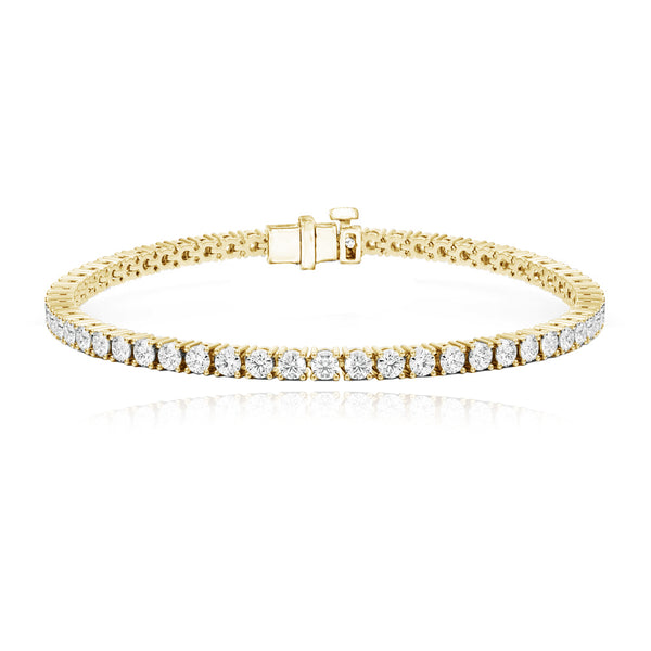 Classic diamond tennis bracelet 6cts in 14k gold, stunning luxury diamond jewelry design.