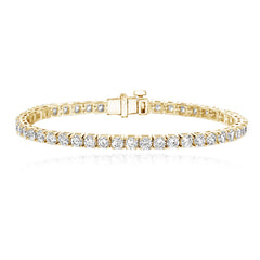 7cts tennis bracelet in 14k gold with diamonds, elegant custom jewelry for women.