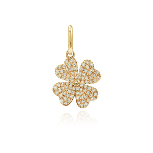 Mini diamond clover charm in 14k gold, elegant lucky charm in luxury diamond jewelry style.