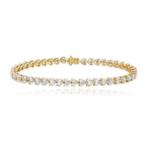 Heart diamond tennis bracelet in 14k gold, romantic fine jewelry for timeless elegance.
