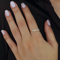 Diamond and Baguette Twist Ring