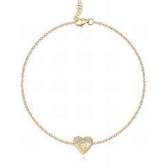 Delicate 14k gold bracelet with scattered dripping gemstones in heart design, a dainty affordable luxury jewelry piece.