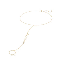 Pavé love gold hand chain in 14k gold, delicate fine jewelry with romantic luxury appeal.