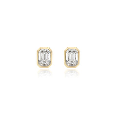 Emerald-cut bezel-set lab-grown diamond stud earrings in 14K yellow gold, 8 carats total weight
