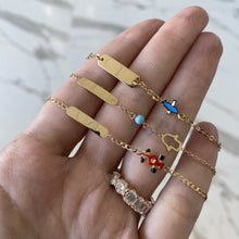 Load image into Gallery viewer, Cutout Hamsa and Turquoise Stone Id Bracelet
