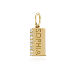 Mini personalized pavé charm in 14k gold with side engraving, a unique piece of personalized jewelry for women.