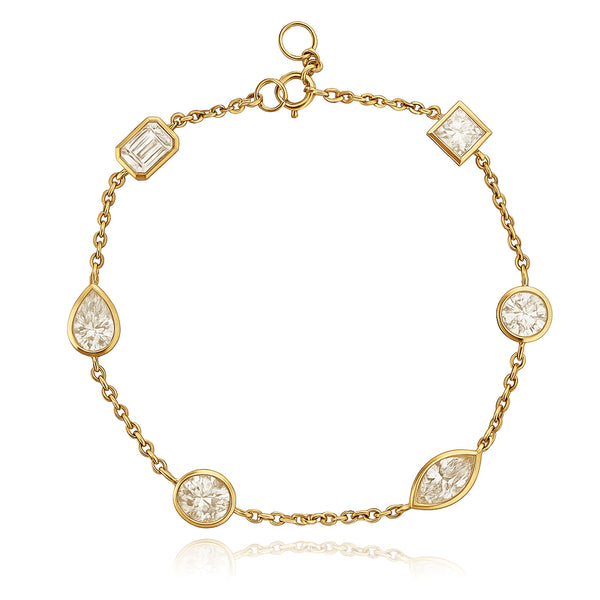 Luxury multi-shape bezel diamond bracelet in 14k gold, elegant fine jewelry online, and modern gold jewelry.