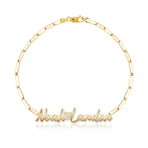 Two name cutout paperclip bracelet with charm in 14k gold, luxury personalized jewelry.