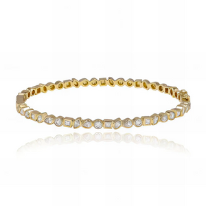 Multi shape bezel diamond bangle in 14k gold, exquisite blend of luxury and dainty design.
