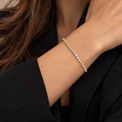 Shared Prong Round Diamond Bangle