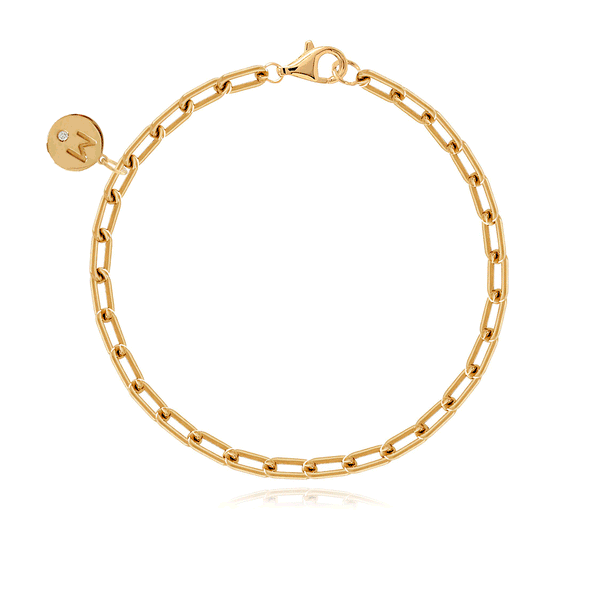 Small rounded paperclip bracelet in 14k gold, perfect for layering and luxury gold jewelry lovers.
