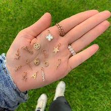 Load image into Gallery viewer, Small Cutout Star Charm
