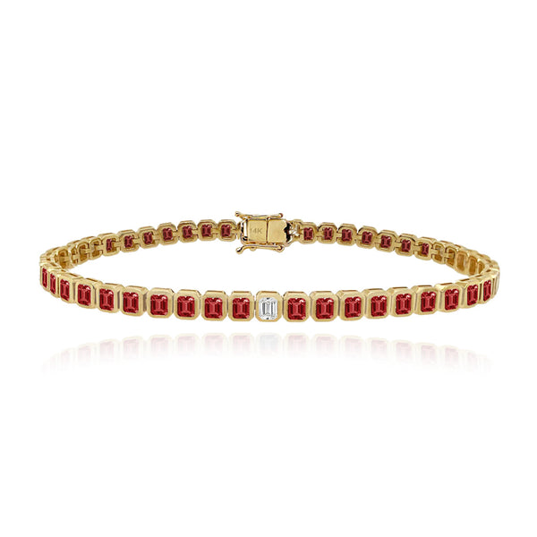 Solitaire diamond gemstone bezel emerald tennis bracelet in 14k gold, colorful custom fine jewelry design.