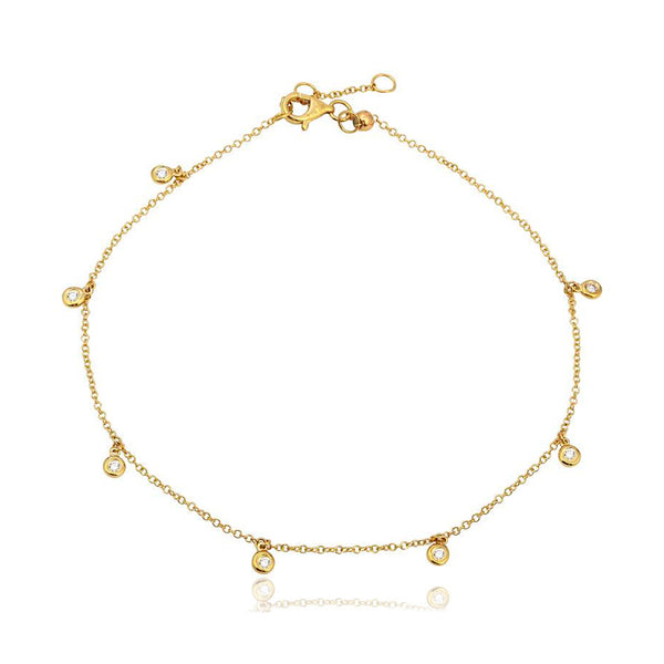 Dangling bezels anklet in 14k gold, shimmering fine gold jewelry for luxe day-to-night looks.