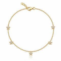Dangling stars anklet in 14k gold, whimsical and elegant luxury jewelry for custom styling.