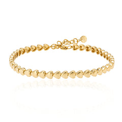 Golden Heart Tennis Bracelet in 14k gold – a delicate heart design, perfect for luxury gold jewelry and timeless elegance