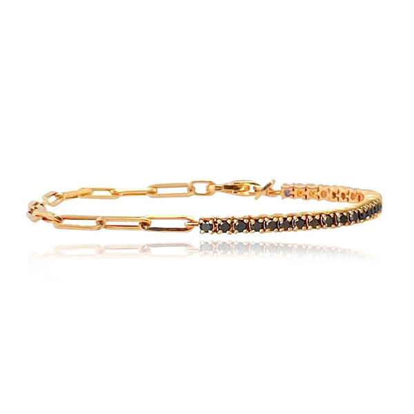 Half paperclip and half black diamond tennis bracelet in 14k gold, bold luxury jewelry style.