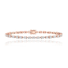 Horizontal multi shaped diamond tennis bracelet in 14k gold, timeless luxury diamond jewelry piece.