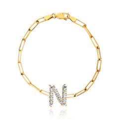 Medium paperclip bracelet with large diamond initial in 14k gold, luxury fine jewelry.