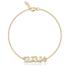 Pavé date bracelet in 14k gold, personalized luxury jewelry with custom date engraving.